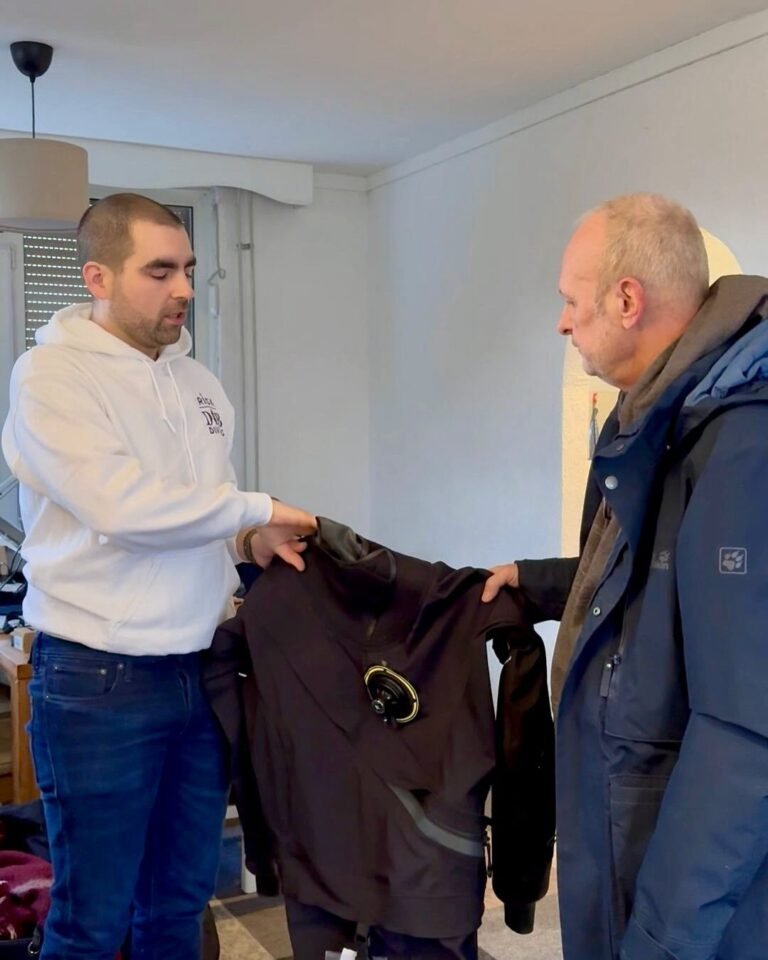 A photo of Rick is showcasing the latest addition to our dive center